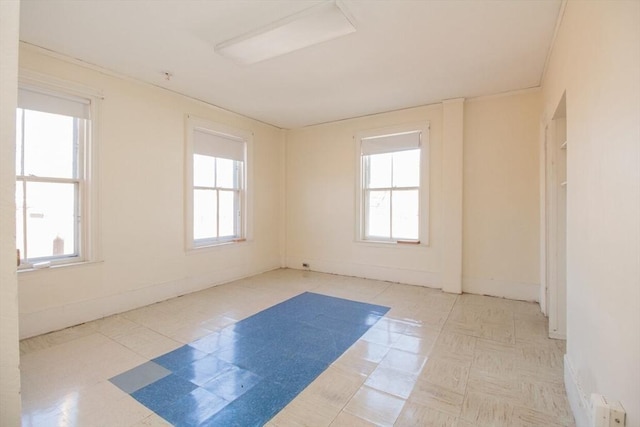 empty room featuring a wealth of natural light