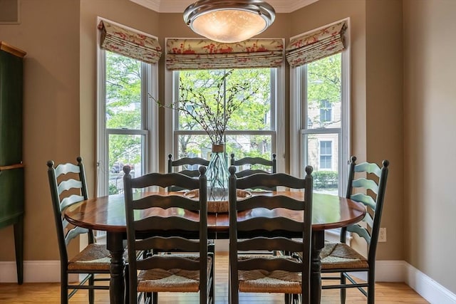 745-A Massachusetts Ave Unit A, Arlington, MA 02476 - dining area with ornamental molding, baseboards, and light wood-type flooring