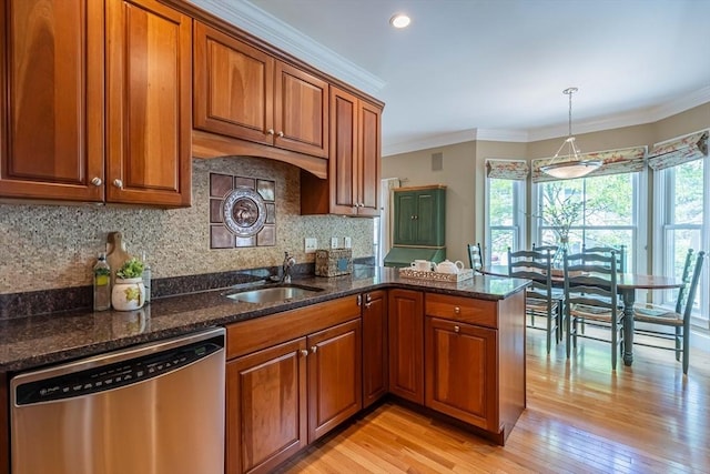 745-A Massachusetts Ave Unit A, Arlington, MA 02476 - kitchen with stainless steel dishwasher, a sink, brown cabinets, crown molding, and recessed lighting