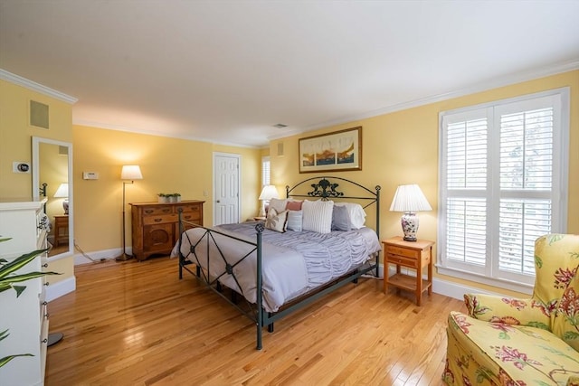 745-A Massachusetts Ave Unit A, Arlington, MA 02476 - bedroom featuring light wood-type flooring, crown molding, and baseboards