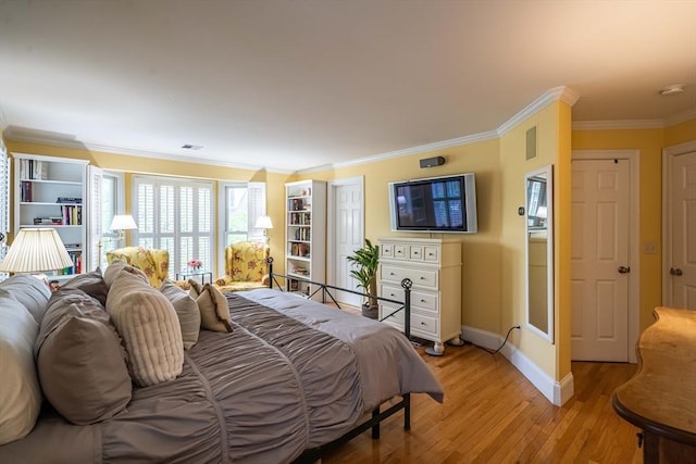 745-A Massachusetts Ave Unit A, Arlington, MA 02476 - bedroom with baseboards, ornamental molding, and light wood-style floors
