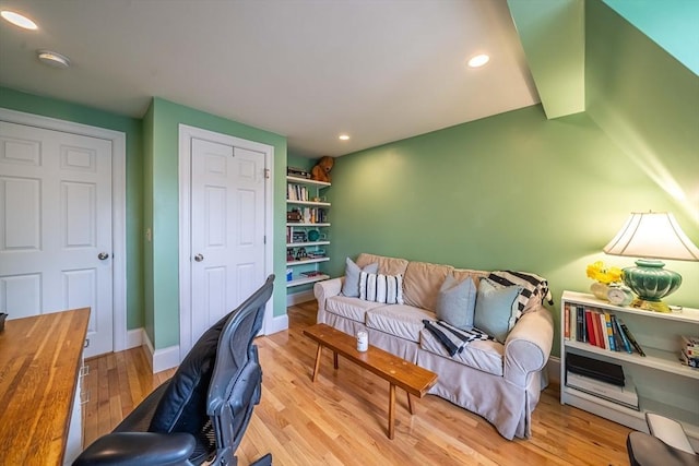 745-A Massachusetts Ave Unit A, Arlington, MA 02476 - living area with wood finished floors, a desk, baseboards, and recessed lighting