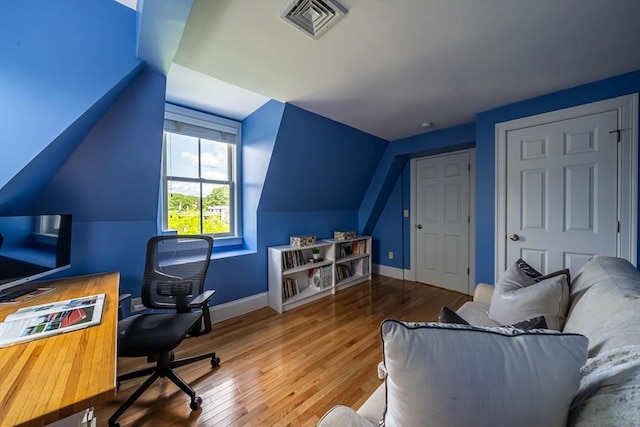 745-A Massachusetts Ave Unit A, Arlington, MA 02476 - office with baseboards, wood finished floors, and lofted ceiling