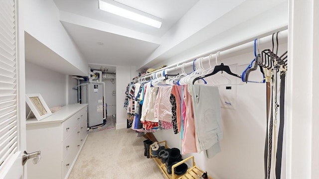 spacious closet featuring gas water heater