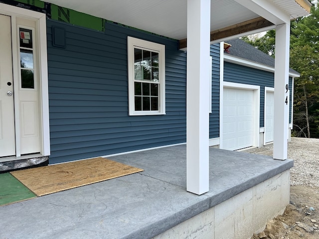 view of patio / terrace with a garage