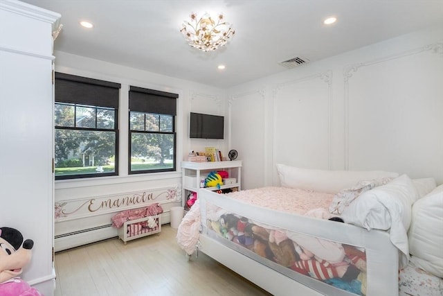 2 Overlook Rd, Canton, MA 02021 - bedroom with baseboard heating, light wood-style floors, and recessed lighting