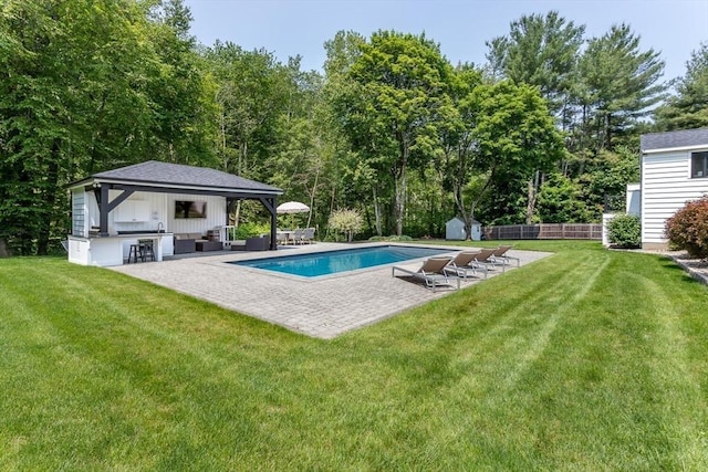 2 Overlook Rd, Canton, MA 02021 - view of swimming pool with area for grilling, a patio area, and a storage shed