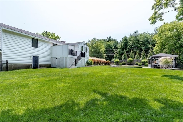 2 Overlook Rd, Canton, MA 02021 - view of green lawn with a gazebo, stairway, and a deck