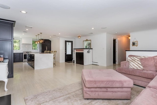 2 Overlook Rd, Canton, MA 02021 - living area with crown molding, baseboard heating, light wood-style floors, and recessed lighting