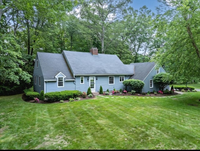 759 Williams St, Longmeadow, MA 01106 - cape cod-style house featuring a front yard and a chimney