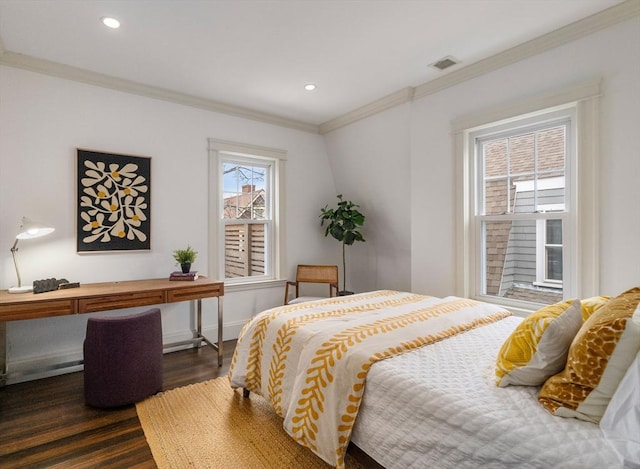 bedroom featuring dark wood finished floors, recessed lighting, visible vents, ornamental molding, and baseboards