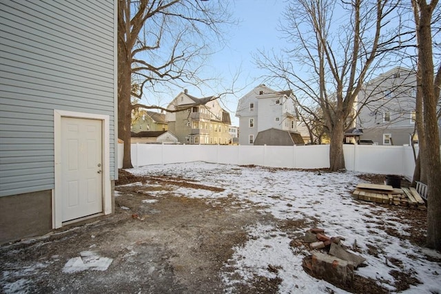 view of yard covered in snow