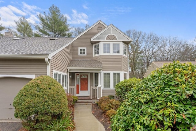 view of front of home featuring a shingled roof