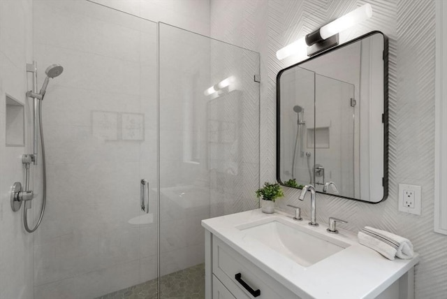 bathroom with vanity and walk in shower