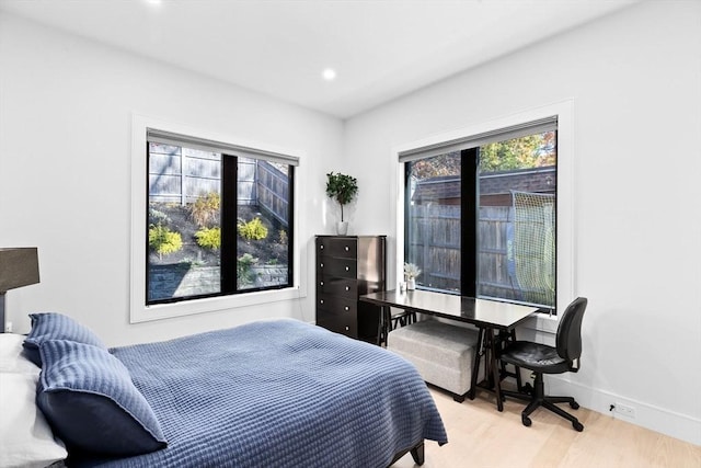 bedroom featuring light wood-type flooring