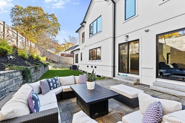 view of patio / terrace featuring cooling unit and an outdoor hangout area