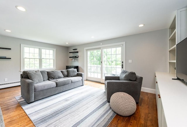 5 Indian Hl, Beverly, MA 01915 - living area featuring healthy amount of natural light, wood finished floors, recessed lighting, and baseboards