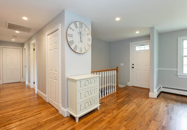 5 Indian Hl, Beverly, MA 01915 - entrance foyer featuring light wood-type flooring, recessed lighting, baseboards, and a baseboard heating unit