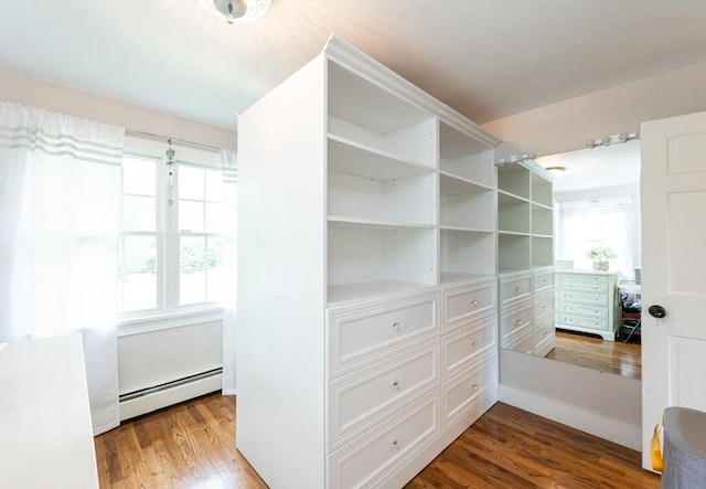 5 Indian Hl, Beverly, MA 01915 - walk in closet with a baseboard radiator and wood finished floors