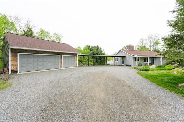 5 Indian Hl, Beverly, MA 01915 - view of front of home featuring a garage and gravel driveway
