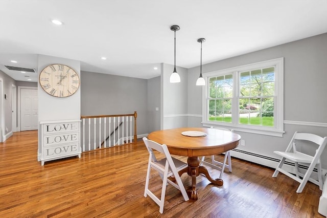 5 Indian Hl, Beverly, MA 01915 - dining room featuring wood finished floors, recessed lighting, baseboards, and a baseboard radiator