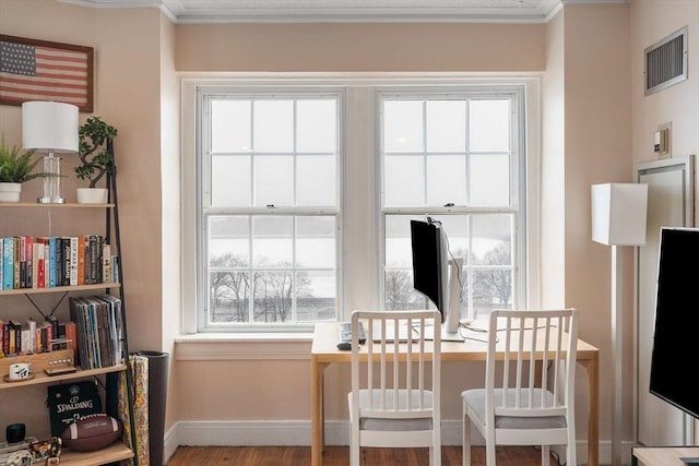 sitting room featuring crown molding and wood-type flooring