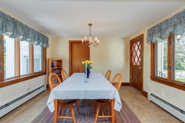 dining area with a baseboard radiator, a chandelier, baseboards, and light tile patterned flooring
