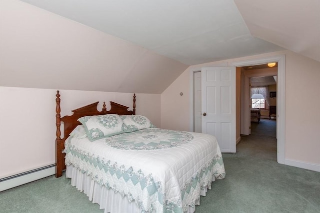 carpeted bedroom featuring baseboard heating and lofted ceiling
