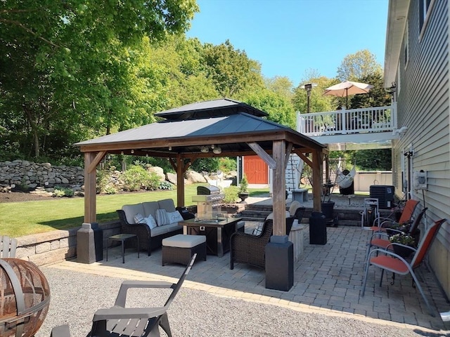 view of patio featuring an outdoor hangout area, a gazebo, central air condition unit, and a wooden deck