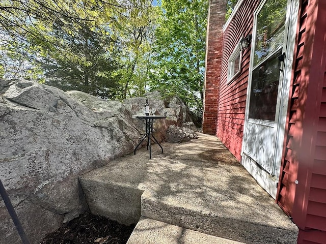 23 Rhodes Cir, Hingham, MA 02043 - view of home's exterior with a patio area