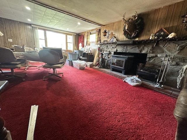 23 Rhodes Cir, Hingham, MA 02043 - living room with wood walls, carpet, and a fireplace