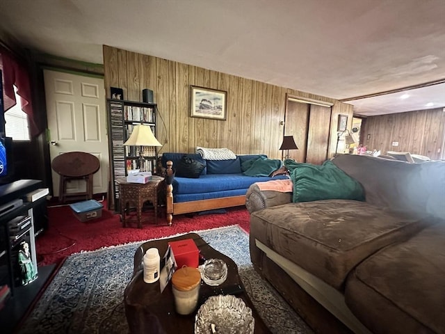 23 Rhodes Cir, Hingham, MA 02043 - living area with wood walls and carpet flooring