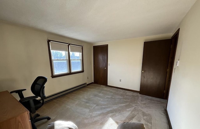 unfurnished office with light carpet and a baseboard heating unit