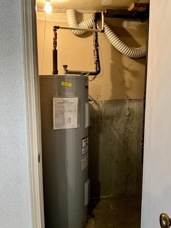 utility room with water heater