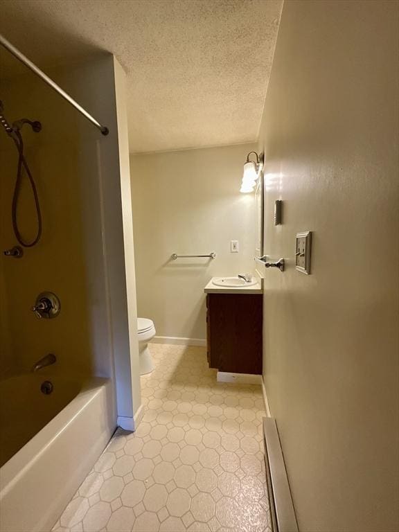 full bathroom featuring a textured ceiling, vanity, shower / bath combination, and toilet