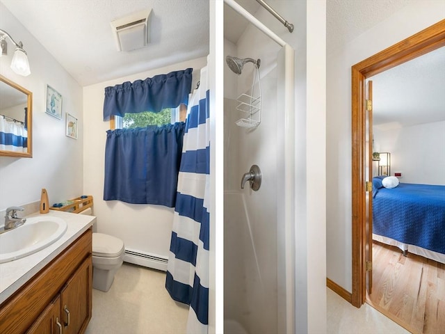 10 Manoogian Cir, Milford, MA 01757 - full bath with baseboard heating, vanity, a shower with shower curtain, and ensuite bath