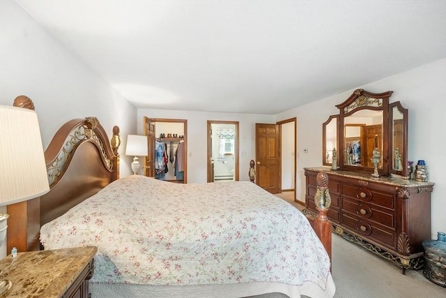 10 Manoogian Cir, Milford, MA 01757 - bedroom with light colored carpet, a walk in closet, and a closet
