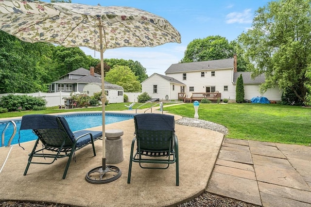 10 Manoogian Cir, Milford, MA 01757 - view of pool with a wooden deck, a patio, and an outdoor structure