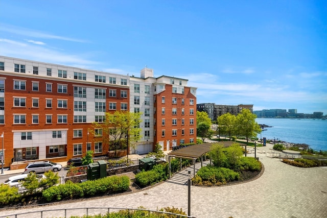 view of property with a water view