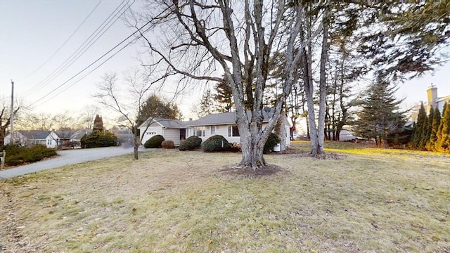 view of front of home with a front yard