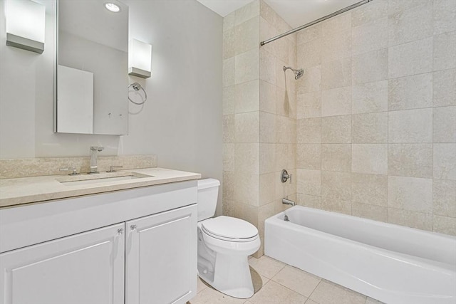 bathroom featuring tile patterned flooring, shower / bath combination, vanity, and toilet