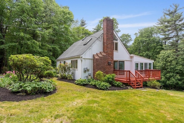 13 Long Ridge Rd, Acton, MA 01720 - back of property featuring a chimney, a wooden deck, and a yard