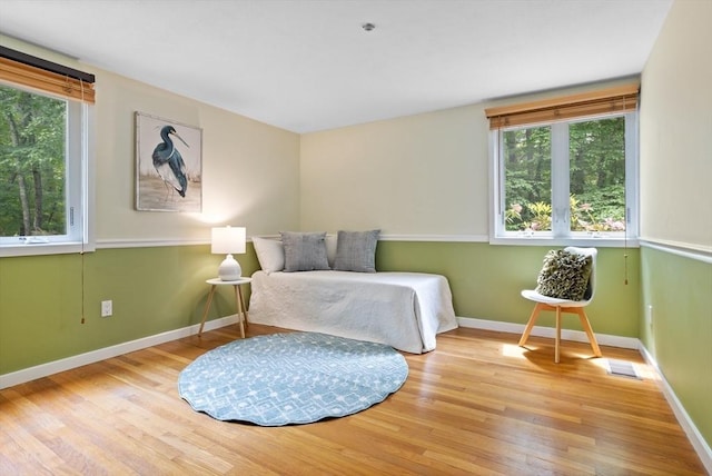 13 Long Ridge Rd, Acton, MA 01720 - living area featuring healthy amount of natural light and wood finished floors