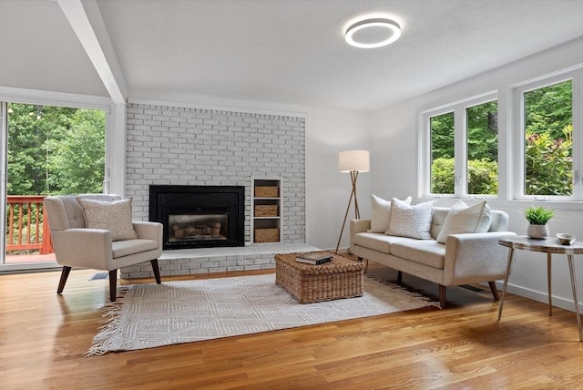 13 Long Ridge Rd, Acton, MA 01720 - living area featuring a fireplace and wood finished floors