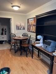 19 Broad St Unit 105, Merrimac, MA 01860 - dining space with crown molding and wood finished floors