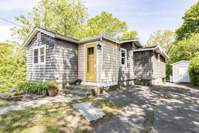 37 Raleigh Rd, Weymouth, MA 02189 - view of front facade featuring a shed and an outbuilding