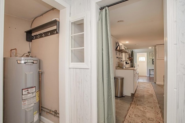 37 Raleigh Rd, Weymouth, MA 02189 - corridor with water heater, a sink, and recessed lighting