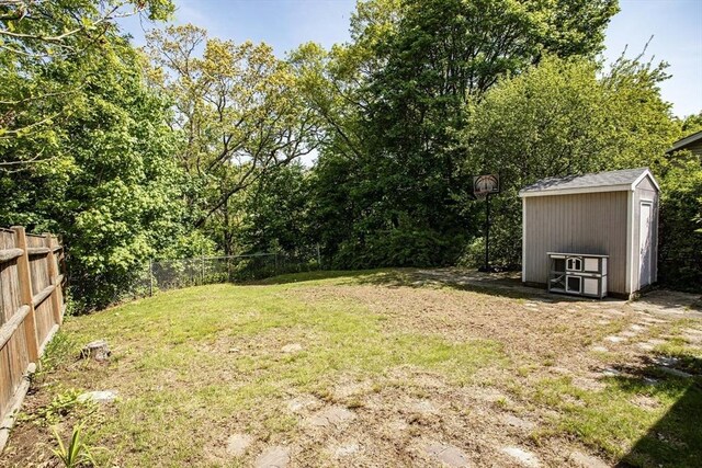 37 Raleigh Rd, Weymouth, MA 02189 - view of yard featuring a storage unit and an outdoor structure