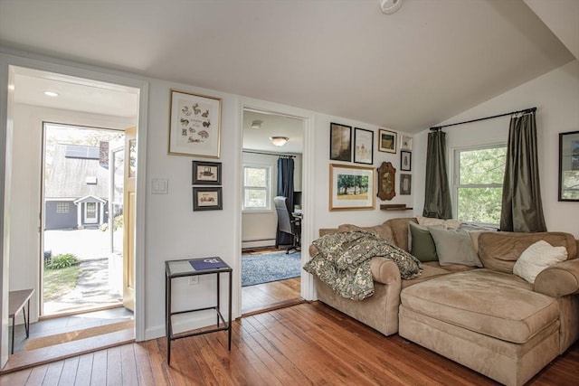 37 Raleigh Rd, Weymouth, MA 02189 - living area featuring wood-type flooring, vaulted ceiling, and baseboard heating