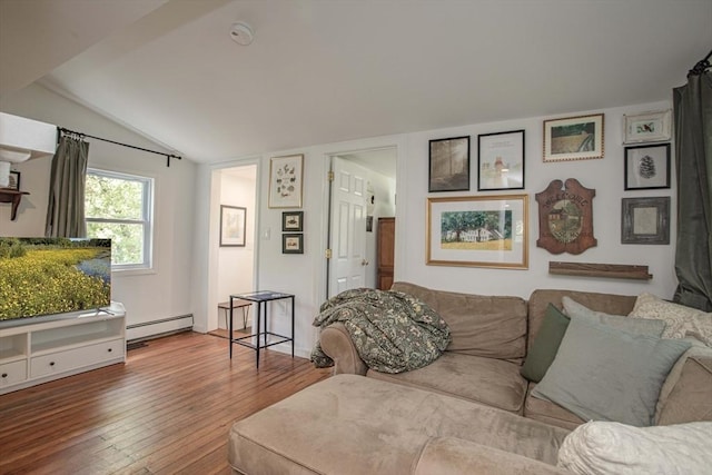 37 Raleigh Rd, Weymouth, MA 02189 - living room with a baseboard radiator, vaulted ceiling, and wood-type flooring